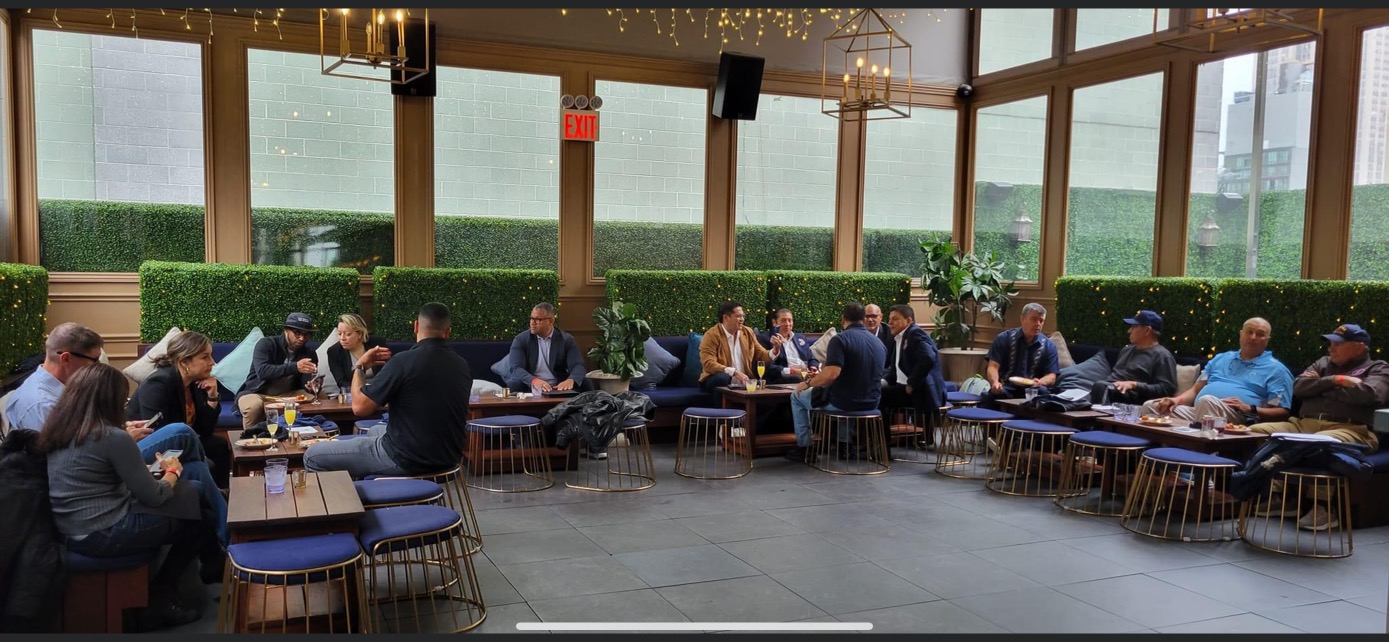 SAPFA members seated together in a lounge for a chapter meeting